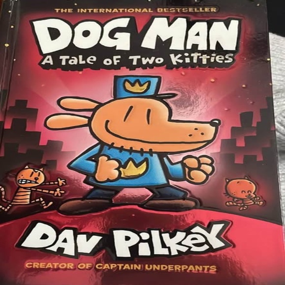 BRAND NEW dog man a tale of two kitties book - Picture 2 of 2